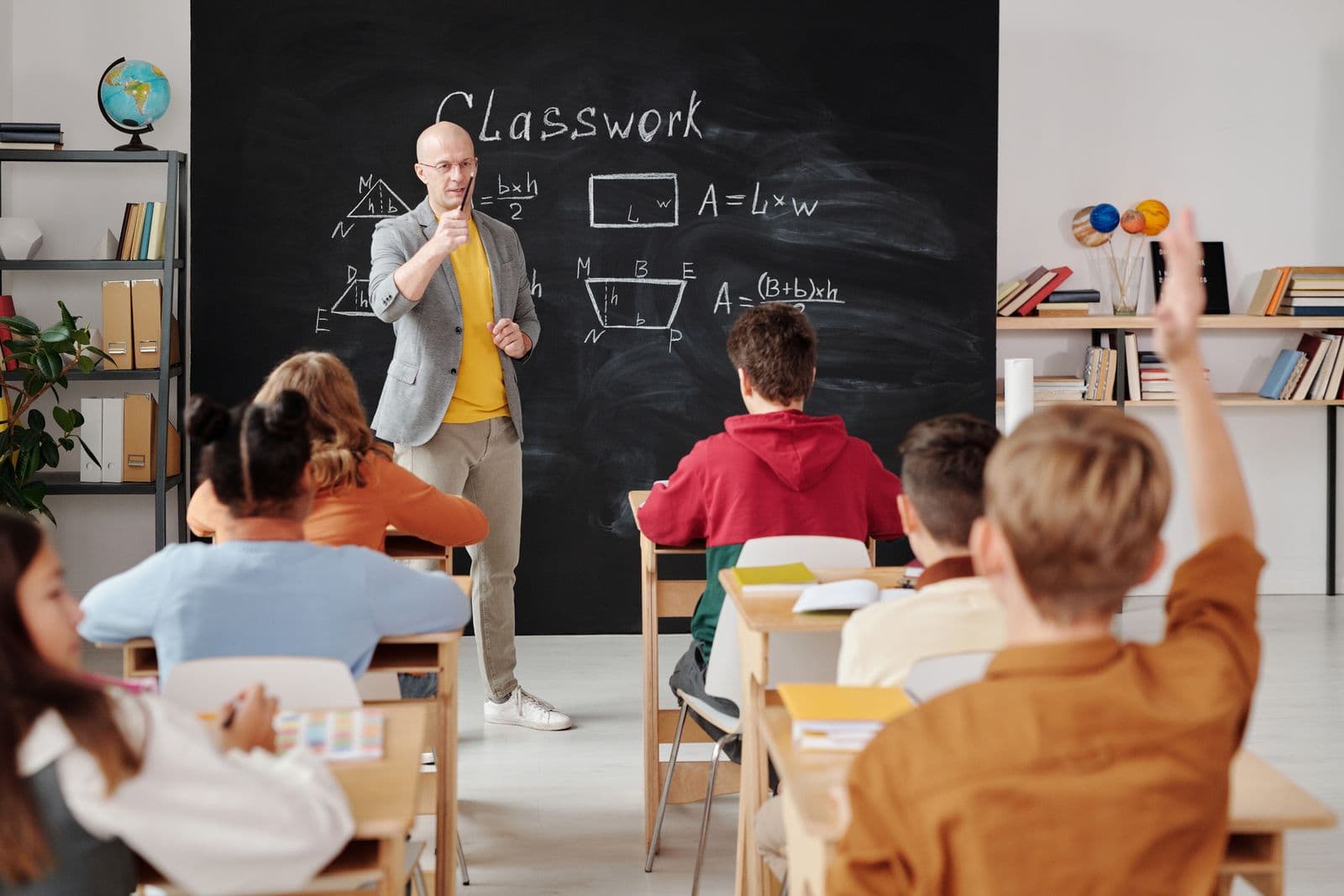 Teacher leading a class at an international school